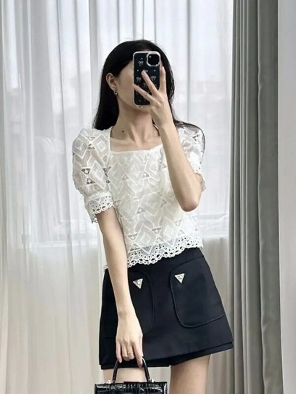 Falda negra con decoración de Metal para mujer, pantalones cortos de cintura alta que combinan con todo, con bolsillos dobles, verano 2024