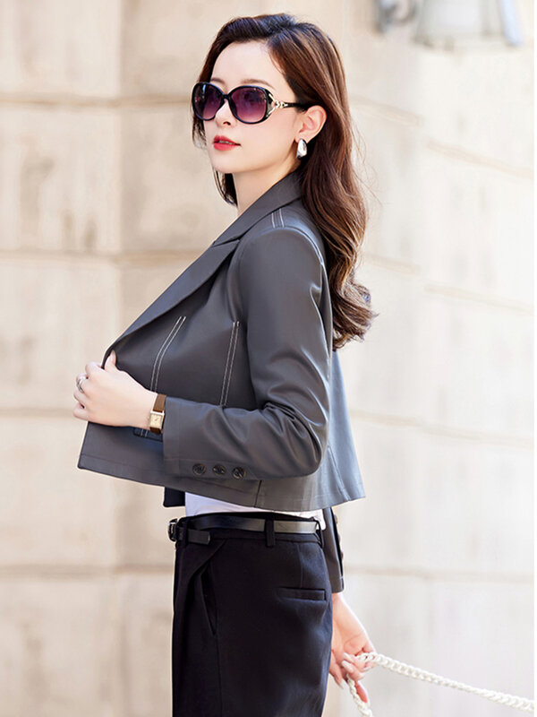 Novo Blazer curto cinzento chique para mulher primavera outono Jaqueta de couro com um único botão e gola de terno da moda Casaco de couro fino dividido