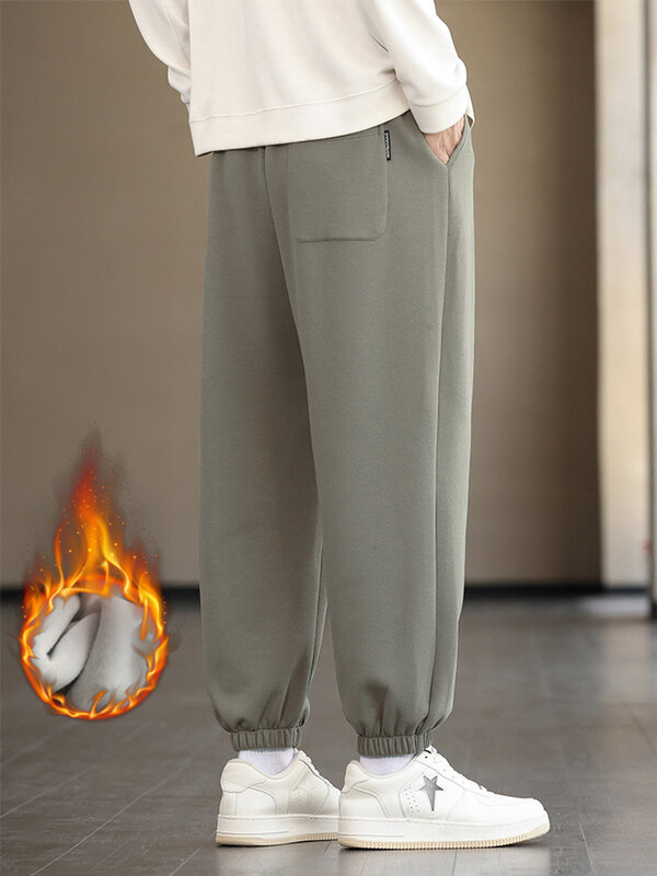 Zimowe grube aksamitne ciepłe spodnie dresowe męskie Streetwear bawełniane luźne spodnie do biegania męskie luźne spodnie z polaru termiczne 8XL