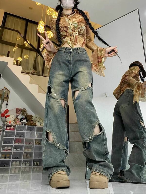 Jeansy główna ulica patchworkowe luźne wydrążone Y2k modne Vintage metalowe guziki proste spodnie denimowe szerokie nogawki