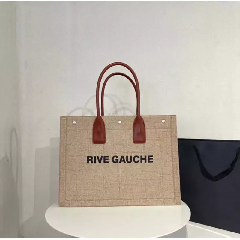 Bolso de mano de lona minimalista para hombre y mujer, bolsa versátil con estampado de letras, de gran capacidad, de diseñador de lujo, talla única, novedad de 2024