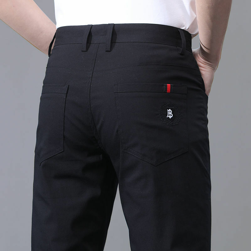 2024 lato cienkie męskie nowe modne jednolity kolor popularne spodnie na co dzień wszechstronne luźne proste wygodne spodnie z kieszeniami