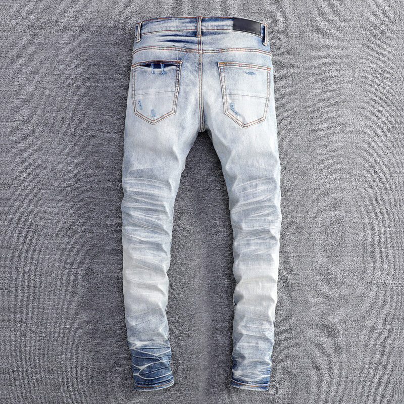 Główna ulica modne dżinsy męskie niebieskie w stylu Retro rozciągają się chudy krój porwane jeansy mężczyzn Bandana załatana projektant Hip Hop markowe spodnie Hombre