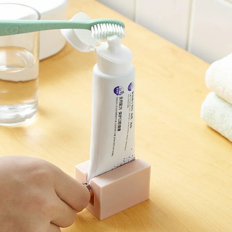 Toothpaste Squeezer Tooth Paste Holder Oral Care Bathroom Tools Tube Cosmetics Press Facial Cleanser Rolling Squeezing Dispenser