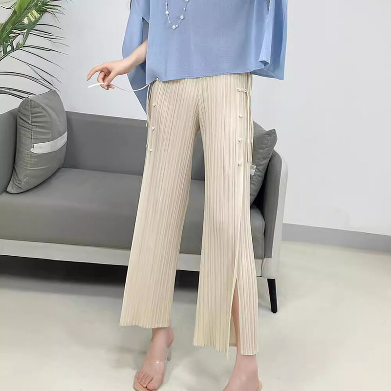 Летние Плиссированные брюки Miyake, новинка 2024 года, стильные девять точек, повседневные брюки в китайском стиле с пряжкой, женские универсальные высококлассные женские брюки