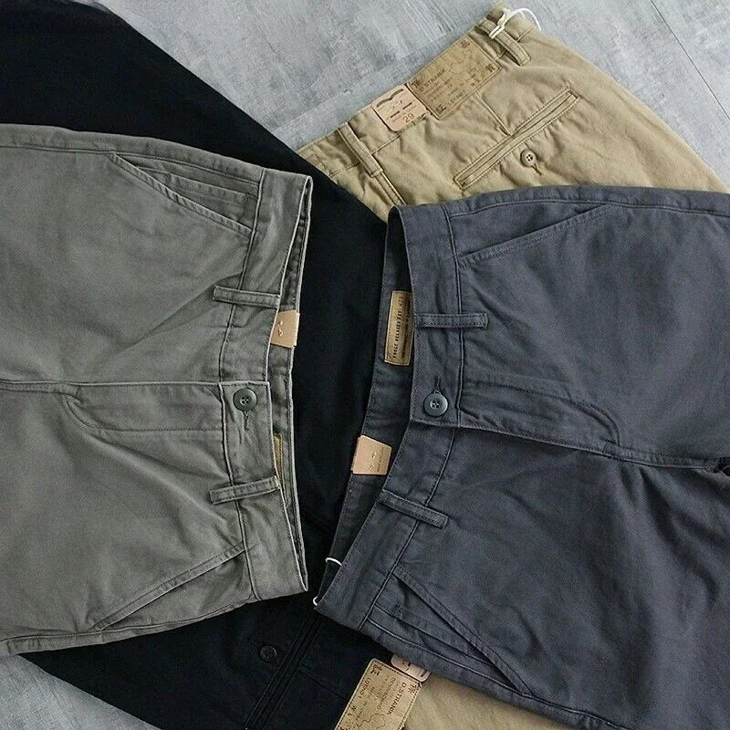 Spodnie nowe spodnie Cargo męskie rozciągliwa talia luźna kieszeń spodnie typu casual jednokolorowe oddychające sportowe szkoleniowe koreańskie spodnie ołówkowe