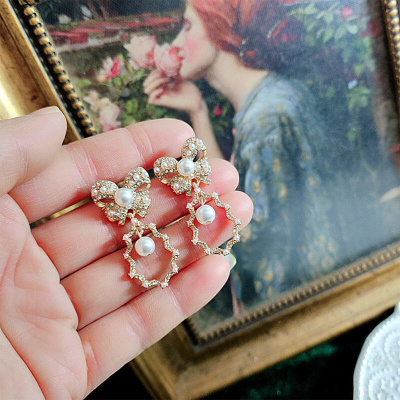 Vintage Temperament Glas Perle Bogen Anhänger Halsketten für Frauen Mädchen Party Geschenk Schmuck Großhandel