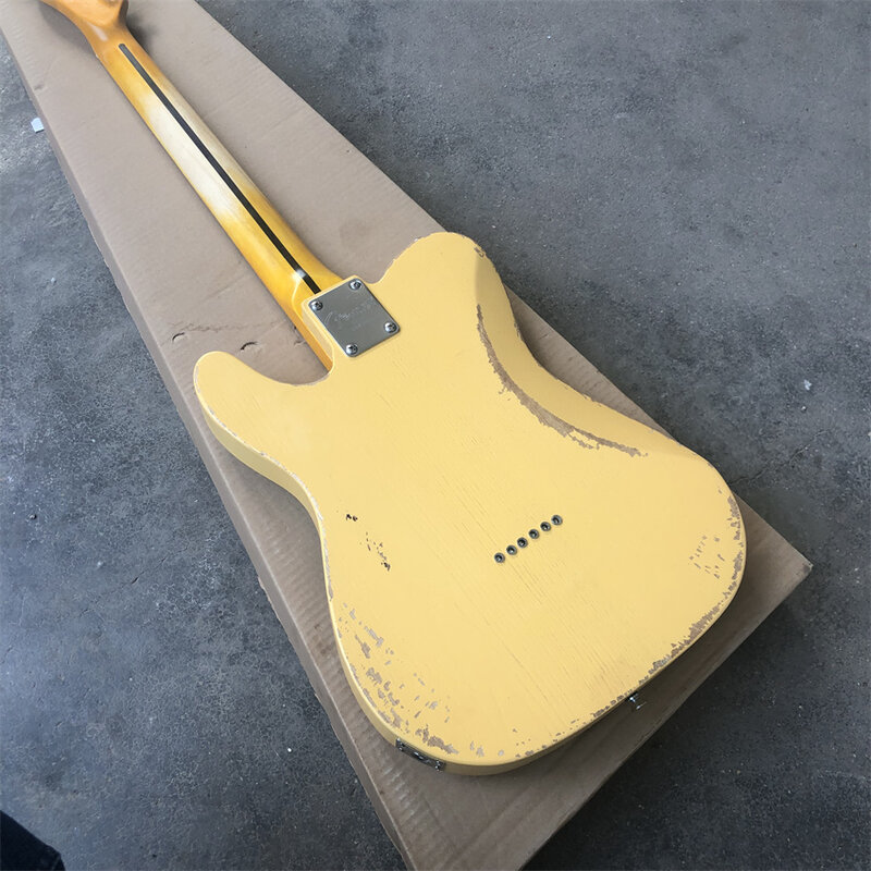 Ash  yellow used electric guitar, real photos, customizable, factory wholesale and retail. Free shipping