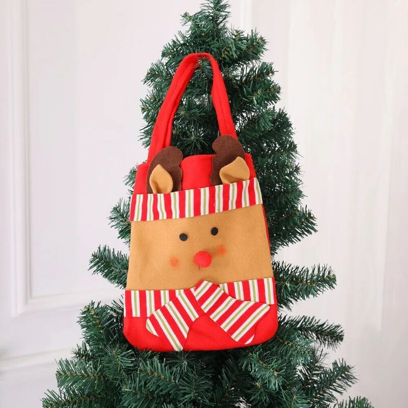 Santa claus不織布のハンドバッグ、雪だるまのギフトバッグ、キャンディーの装飾