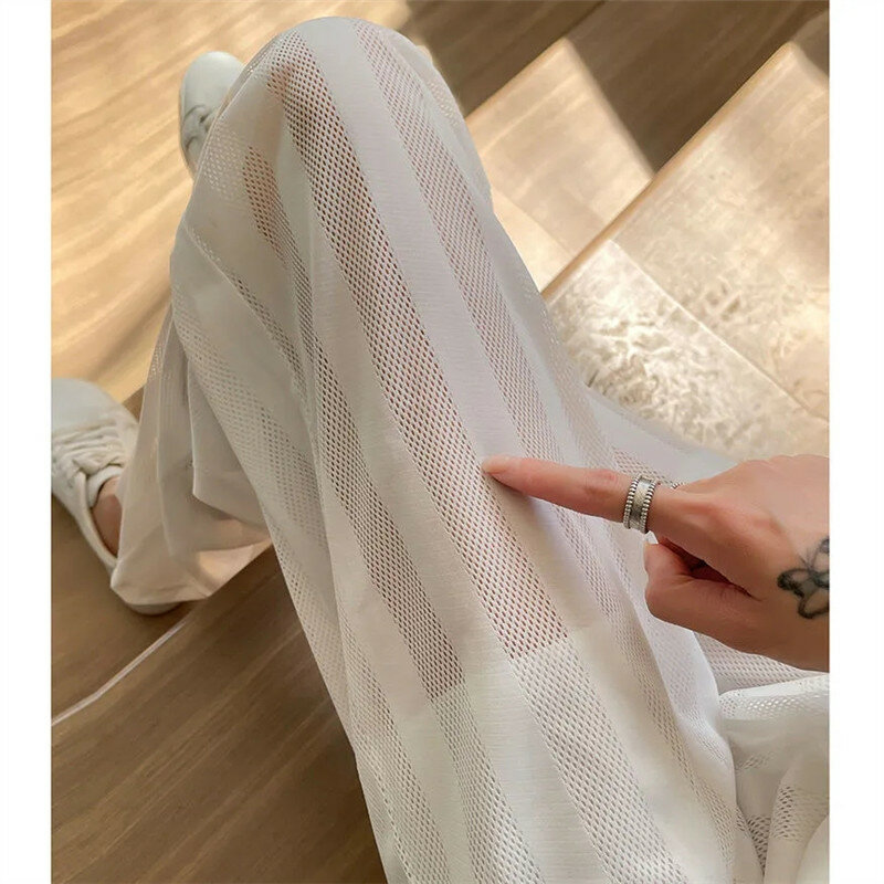 Moda coreana de seda gelo calças largas femininas verão 2023 tthin baggy calças de cintura alta senhoras dividir casual malha calças retas
