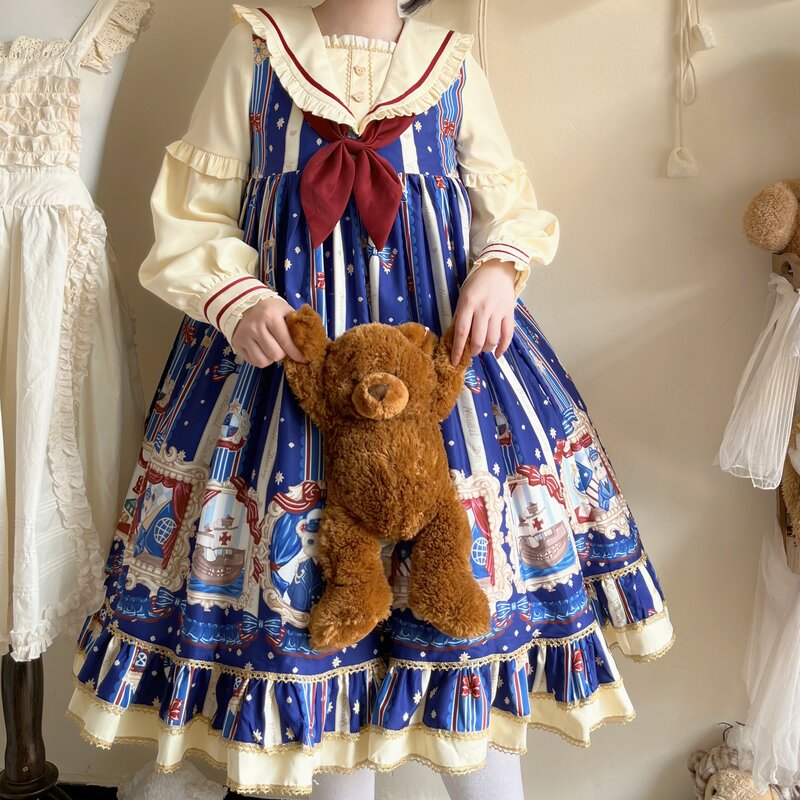 Jesienna sukienka Lolita sukienka Kawaii OP z długim rękawem słodka kreskówka granatowa nadruk niedźwiedzia sukienka na imprezę słodka luźna, z kokardą sukienka Mini z falbankami