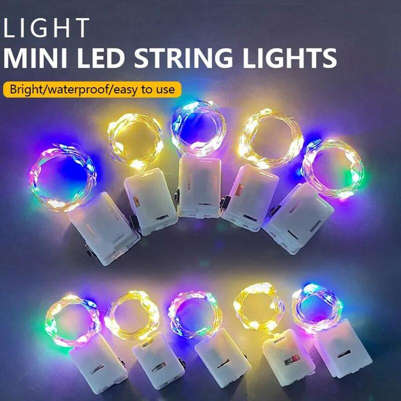 Mini guirnalda de luces de hadas Led de alambre, 1m, 2m, batería Cr2032, cadena de luz de Navidad, árbol pequeño, luces Flash de cadena de año, P9n2, nuevo G6o0