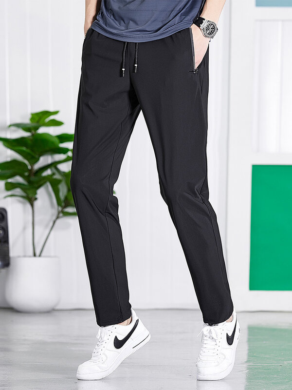 2022 nuovi pantaloni sportivi rossi da uomo in Nylon traspirante Spandex Cool Joggers Plus Size Sportswear tasche con Zip pantaloni dritti lunghi