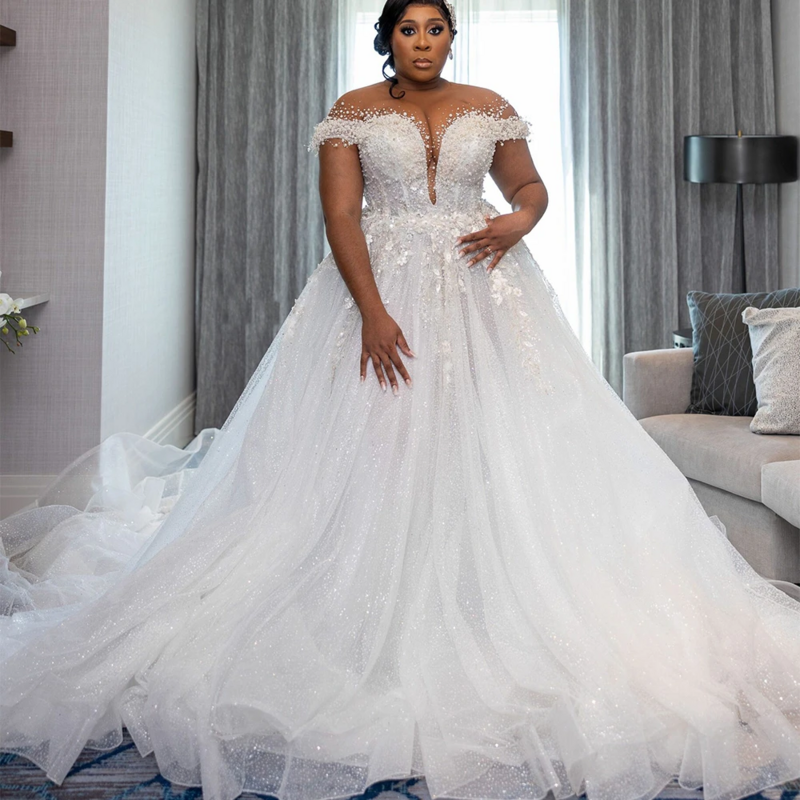 Luksusowe afrykańskie przezroczysta szyja suknie ślubne koraliki cekiny aplikacje Plus rozmiar kobiety suknie ślubne eleganckie Vestido De Novia