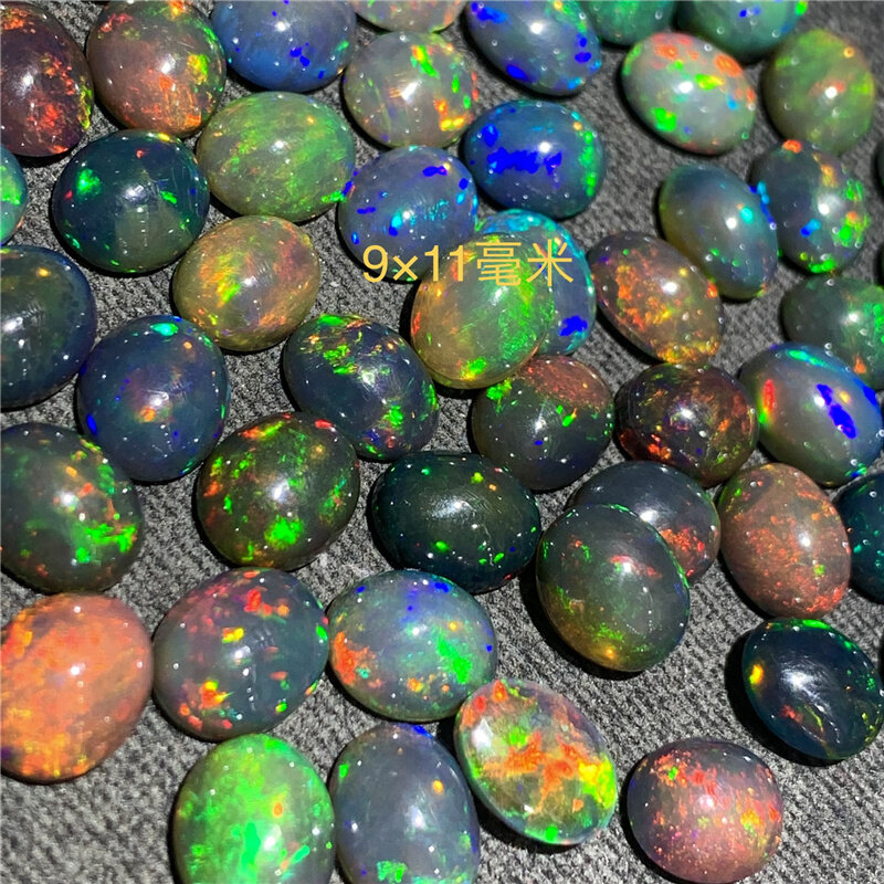 Baru Opal Hitam Alami Gandum Besar Opal Datar Batu Telanjang Oval 9*11 Mm Dapat Digunakan Sebagai Liontin Cincin