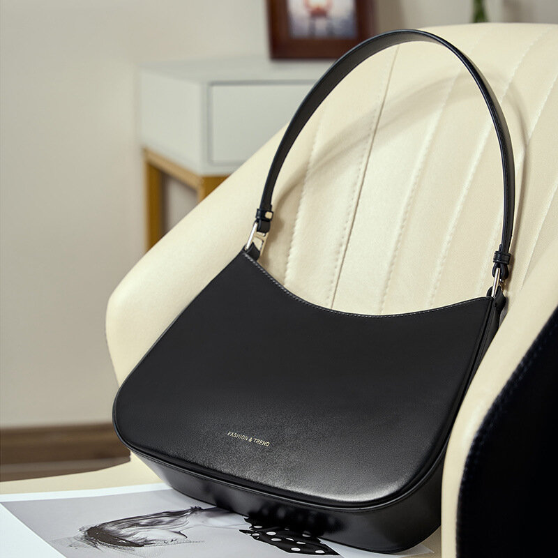 Borsa Hobo di design di nicchia borsa da donna in pelle una borsa a tracolla dal design minimale, borsa da donna