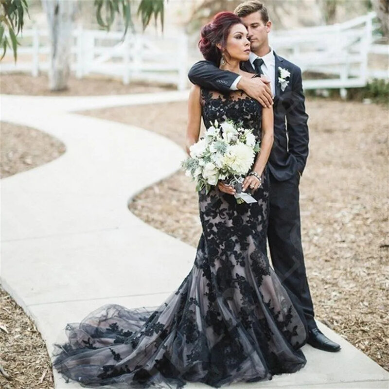 Niepowtarzalna gotycka czarna suknia ślubna z okrągłym dekoltem bez rękawów koronkowa aplikacja syrenka tiul do podłogi suknia na bal maturalny panny młodej