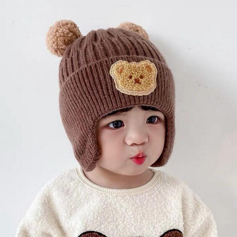 子供の漫画クマニット帽、耳保護、ぬいぐるみボール、厚く、暖かい、柔らかく、ユニセックスの赤ちゃん、冬