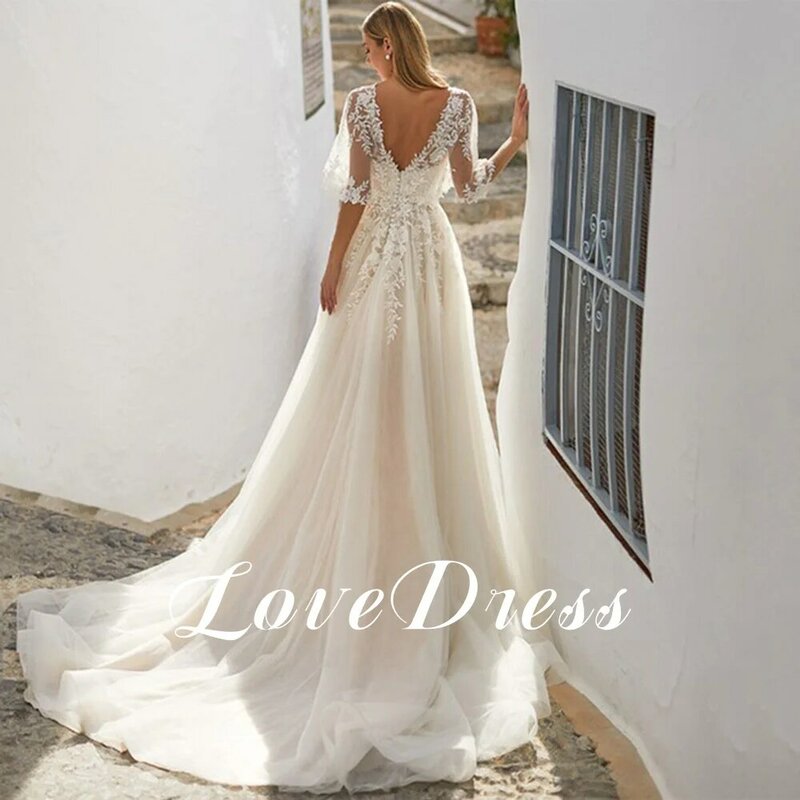 Lovedress v-neckウェディングドレス、ハーフシャウルスリーブ、レースアップリケ、自由奔放に生きる、背中の開いた花嫁のドレス、Aラインスイープトレイン