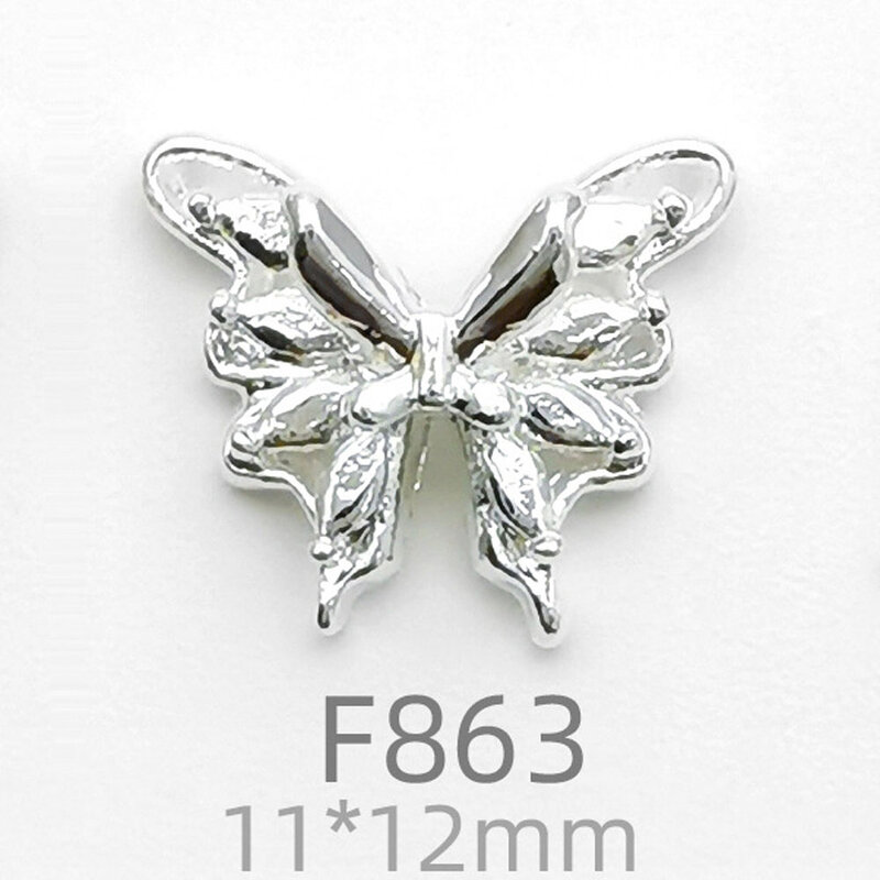 Dijes de diseño de mariposa de aleación 3D para decoración de uñas, accesorios de manicura con diamantes de imitación, arco, abeja, planeta, a granel, 10 unids/lote por bolsa