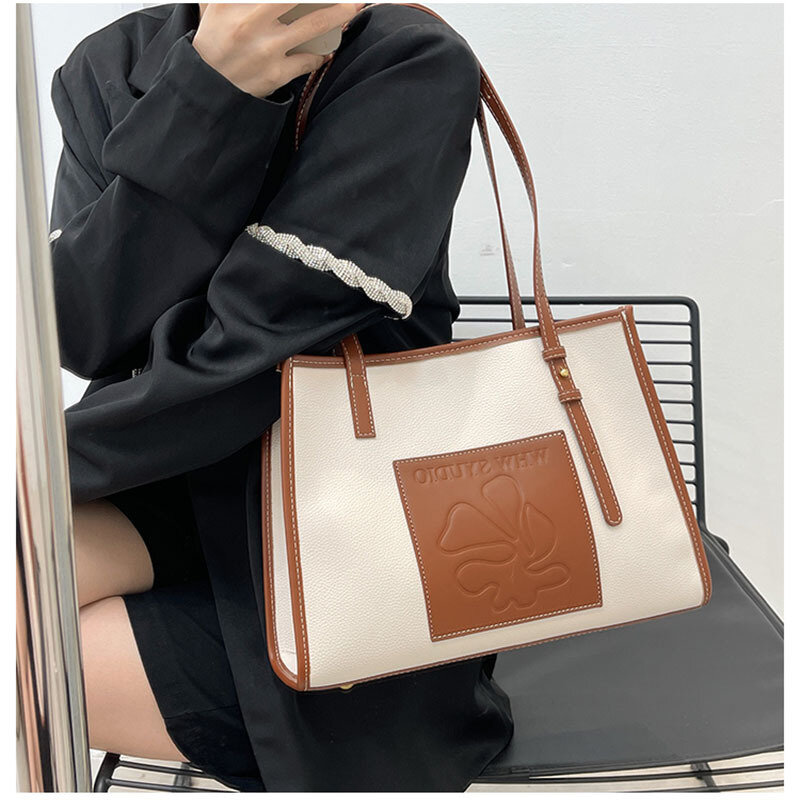 Large capacity tote bag New bag Women's small shoulder bag Autumn and winter cowhide cross body large bag Leather women's bag