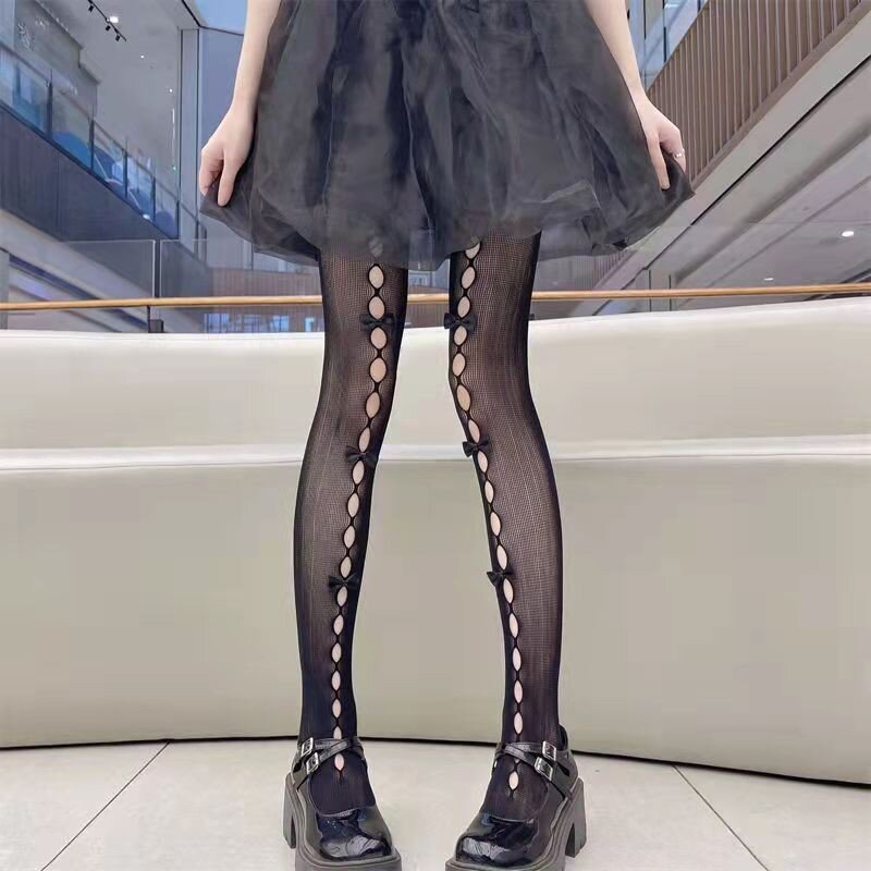 Lolita Cosplay ragazze Bowknot scava fuori collant Sexy sottile Ins marea collant di pizzo calzini Anime nero bianco calze di seta a rete