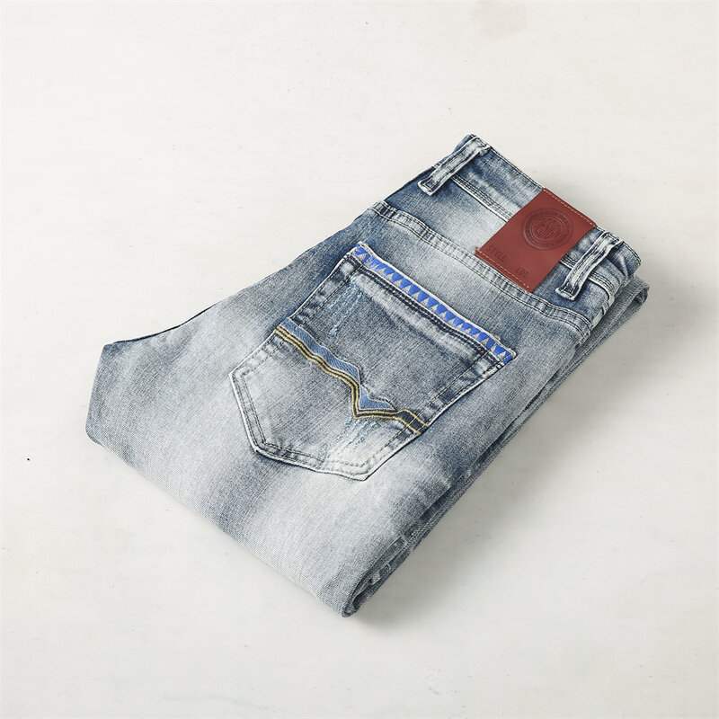 Włoski projektant modne dżinsy męskie Retro szaro-niebieski gładki, elastyczny rozciągliwe dopasowanie porwane jeansy mężczyzn w stylu Vintage spodnie dżinsowe Hombre