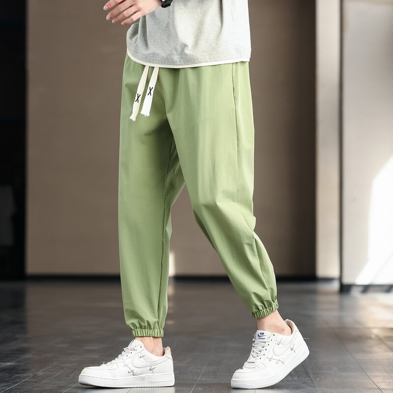 2024 New Arrival letnie spodnie męskie moda codzienna męskie bluzy luźne modne spodnie męskie lodowe Shreds szybkoschnące dziewiąte spodnie