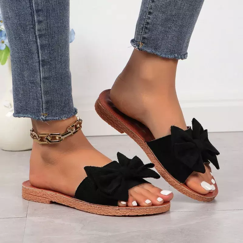Neue Schuhe für Frauen Mode Damen Hausschuhe Butter knoten Schuhe Frauen flache Rutschen Damen lässig Strand Flip-Flops Frauen