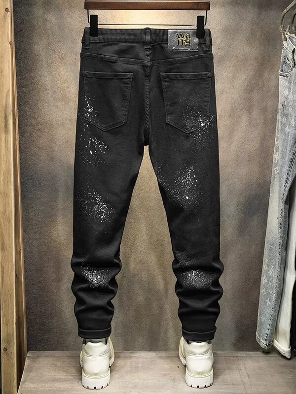 Pantalones vaqueros rasgados elásticos negros para hombre, Jeans rasgados ajustados pintados, pantalones de lápiz de mezclilla de Hip Hop de diseñador parcheado, moda de calle alta