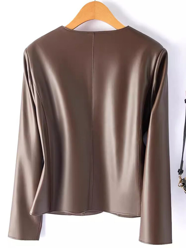 Nova jaqueta de couro para mulheres na primavera e no outono Casaco de pele de carneiro solto com decote em O vintage Casaco curto casual de couro dividido