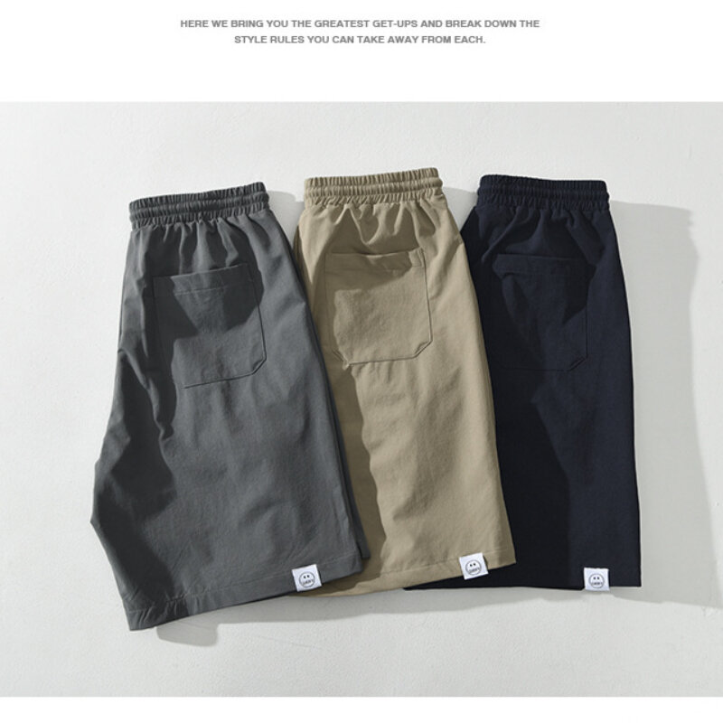 2024 lato nowy Casual Cargo szorty w jednolitym kolorze odzież męska luźny sznurek męskie spodnie AZ841-1