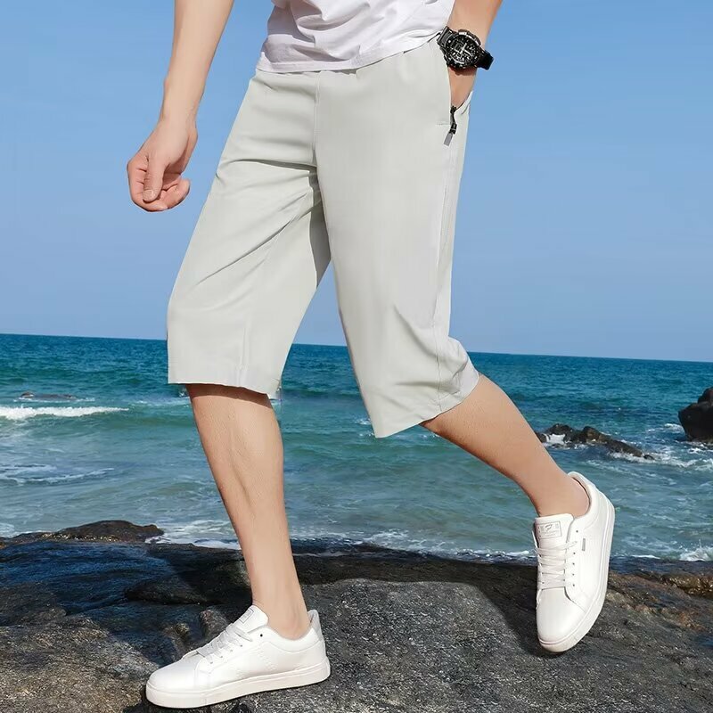 2024 letnie, cienkie, luźne spodenki z rozciętym rozciętym rozciętym męska letnia odzież sportowa lodowy jedwab szybkoschnąca na co dzień spodnie z nogawkami do polowy łydki