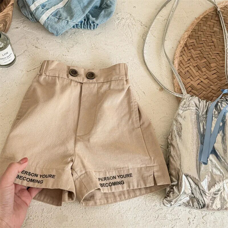 Pantalones cortos holgados para niño y niña, Shorts informales con estampado de letras a la moda, versátiles, de algodón, novedad de verano 2024