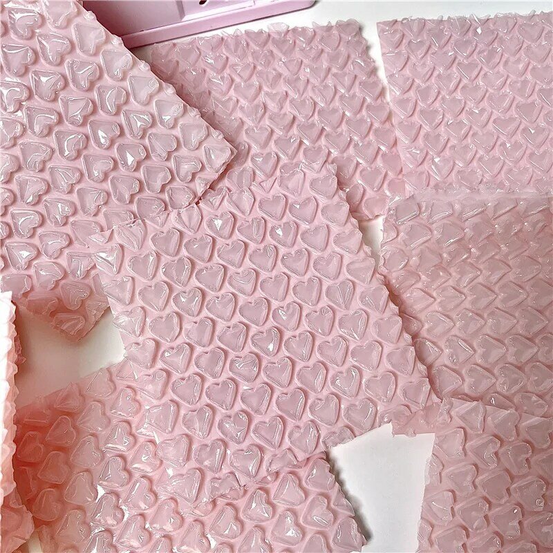 ピンクの粘着性ビニール袋,小さなビジネス用品,パッド入り封筒,バッグ,10個