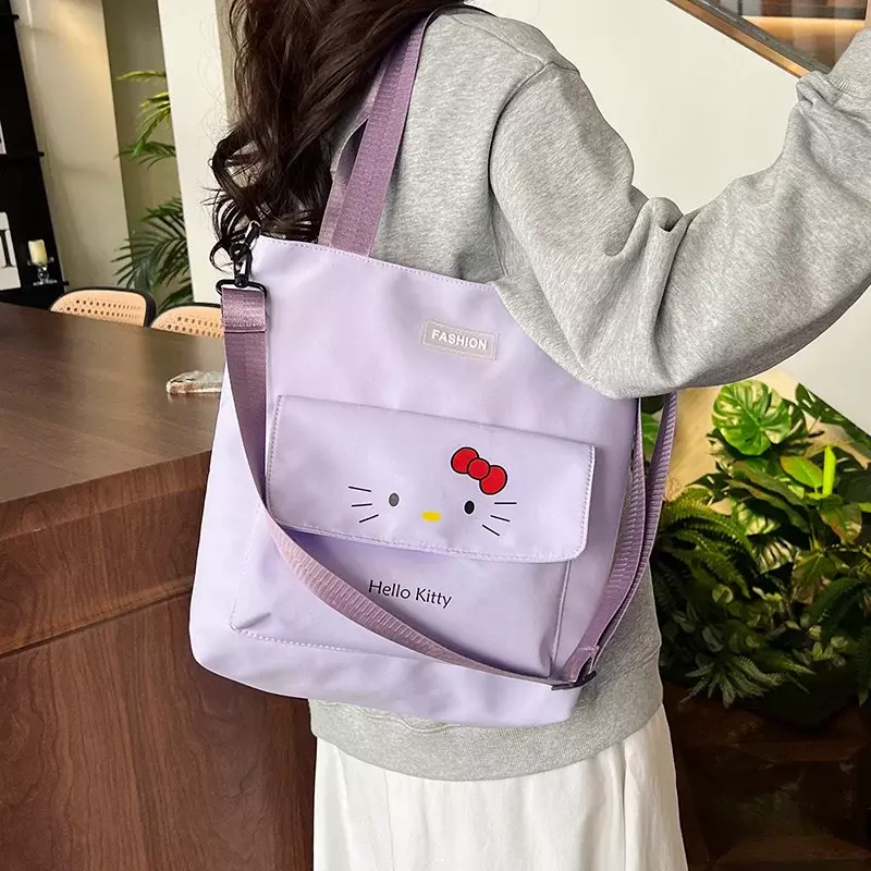 Sanrio-Bolsa de mensajero de Hello Kitty, bolso de un solo hombro con dibujos animados, ligero y de gran capacidad, protección de la columna vertebral, perro