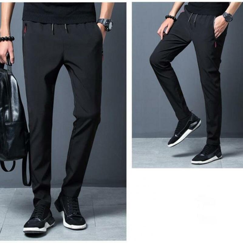 W stylu Casual Fit męskie spodnie szybkoschnące męskie spodnie sportowe z bocznymi kieszeniami zapinanymi na suwak elastyczna talia dla trening gimnastyczny