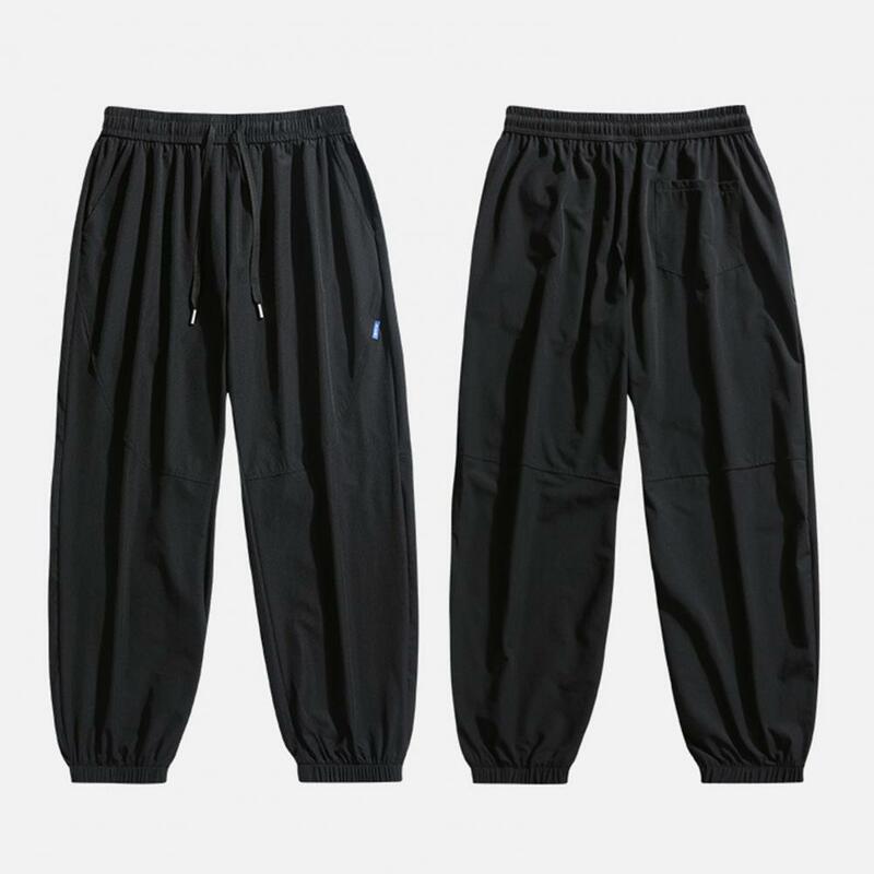 Pantalones atléticos de secado rápido para hombre, pantalones deportivos con bolsillos laterales, cordón de cintura elástica, talla grande, Color sólido para trotar