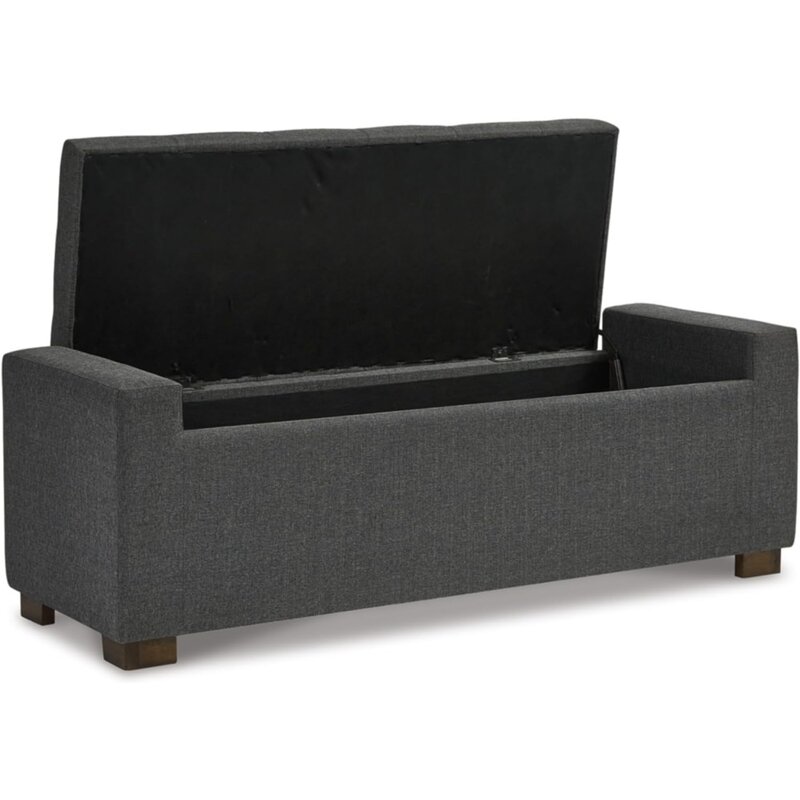 Trendy trunk ottoman is crafted with a polyester gray upholstery, a tufted seat cushion with a hinged lid for access to storage