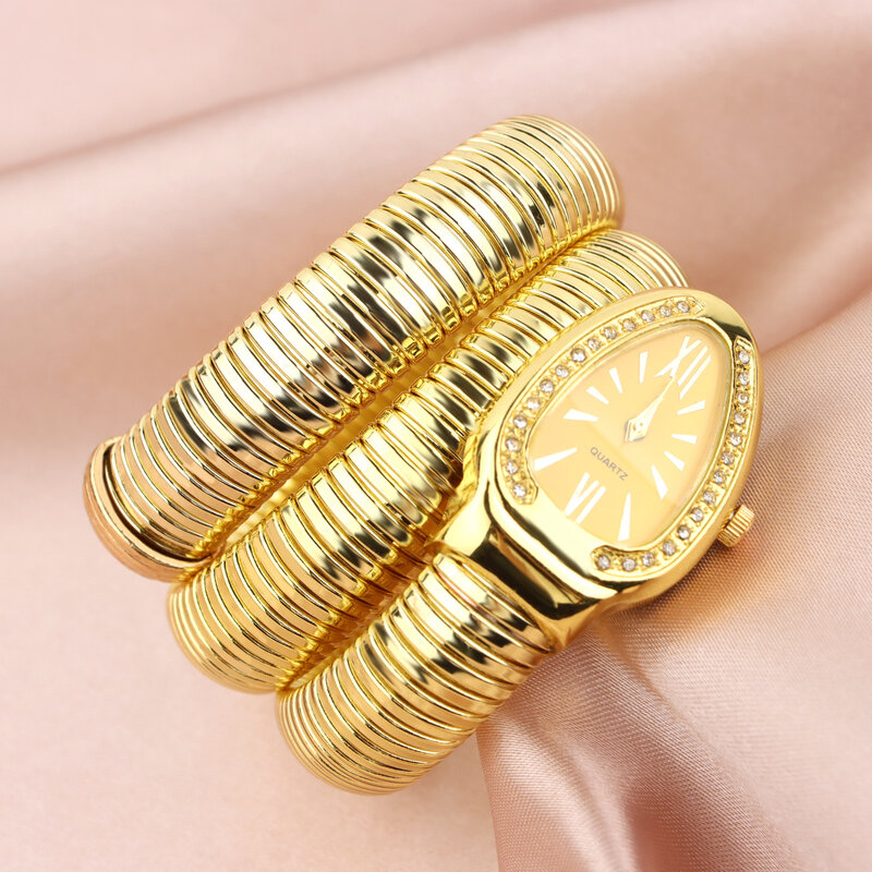 Часы наручные женские кварцевые со змеиным браслетом, люксовые уникальные стальные золотистые, с браслетом