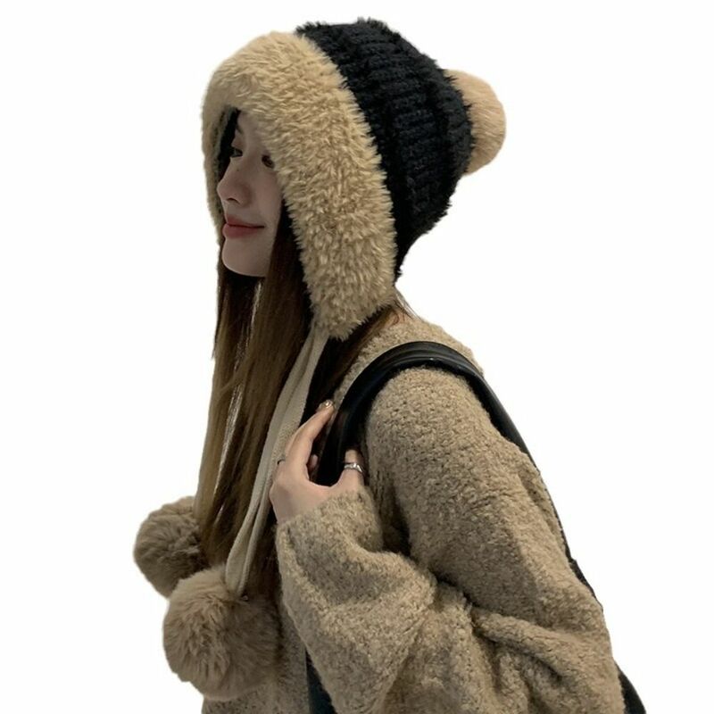 Sombrero de lana con bola de pelo para mujer, gorro de lana suave y cálido, protección para los oídos, gorro de cubo de felpa esponjoso a prueba de viento, Invierno