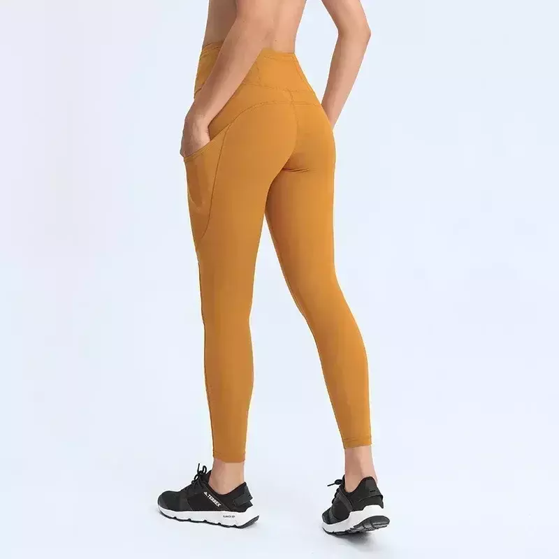 กางเกงรัดรูปเอวสูงสำหรับผู้หญิงผ้าเลม่อนเอวสูงมีความยืดหยุ่นมีหลายกระเป๋ากางเกงโยคะฟรีไซส์25 "กางเกงวิ่งสีข้อเท้า