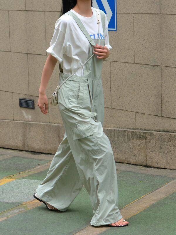 Pantaloni larghi con cinturino allentato con decorazione tascabile in tinta unita Casual da donna primavera/estate