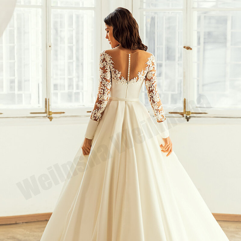 Encantador vestido de cetim com bolsos, Top Ver Através Beading Applique, mangas compridas, uma linha vestido de noiva