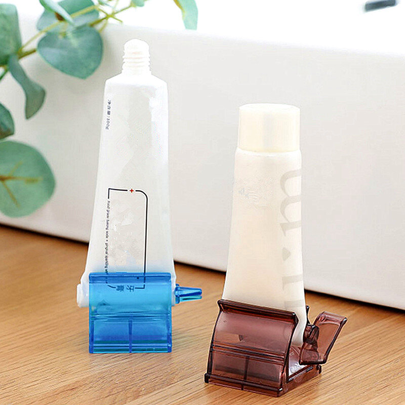 جديد 4 ألوان المنزل البلاستيك معجون الأسنان أنبوب عصارة المتداول حامل سهلة موزع الحمام توريد الأسنان تنظيف الملحقات
