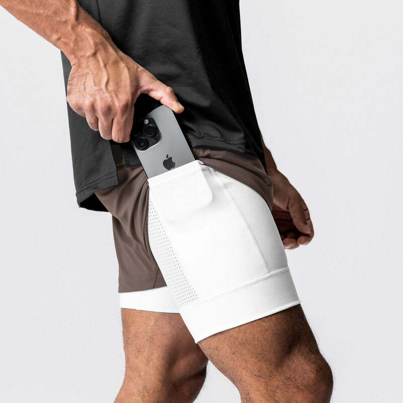 Celana pendek olahraga Fitness Eropa pria, celana pendek nilon latihan otot lari elastis cepat kering, Amerika dua lapisan untuk pria