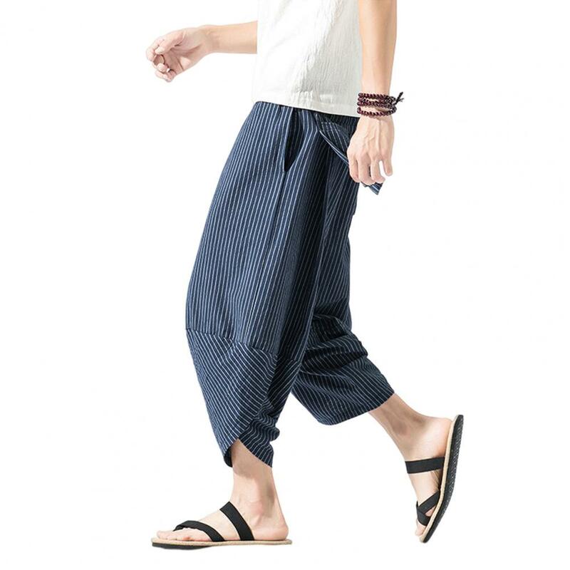 Calça masculina de verão cortada, cintura com cordão elástico, estampa listrada vertical, harém para streetwear