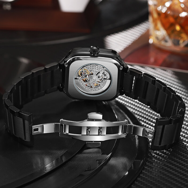 นาฬิกาข้อมือลายโครงกระดูกสแตนเลสผู้ชายแฟชั่นหน้าปัดสี่เหลี่ยมนาฬิกากลไกอัตโนมัติเรืองแสงนาฬิกาผู้ชาย