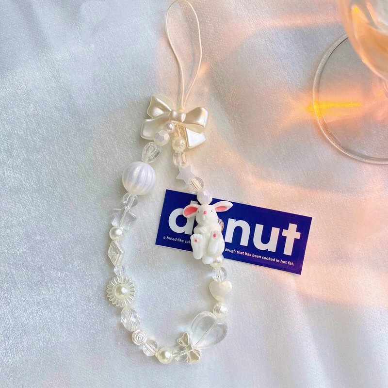 Colgante de cuerda antipérdida para teléfono móvil, cadena de decoración con lazo de estrella de conejo blanco, accesorios de joyería para mujer 2023