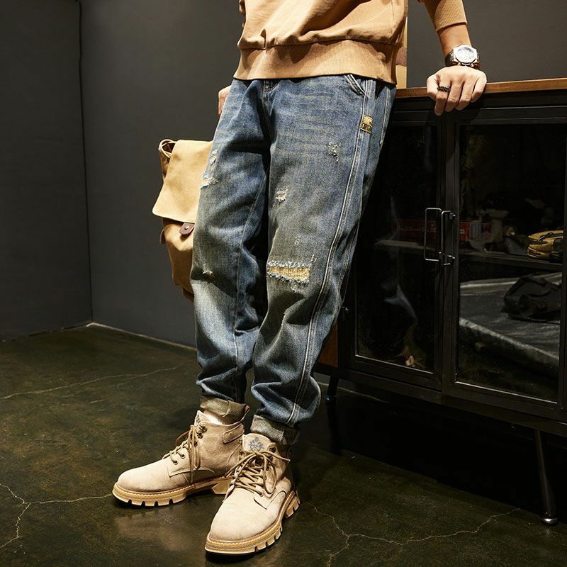 Moda w stylu Vintage luksusowe męskie koreańskie jeansy casualowe spodnie jeansowe z naszywkami na wiosenne jesienne spodnie luźna, workowata na co dzień